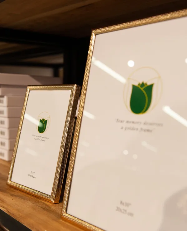 Merken_Weiszgroup_fotolijst_goud