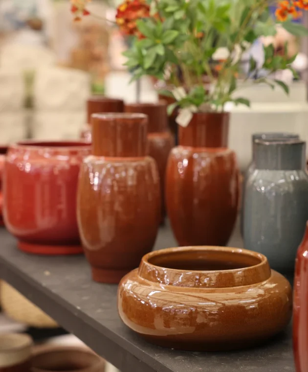 orange and red vases for the autumn season at TICA